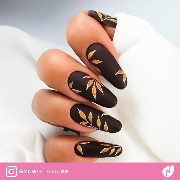 Leaf-themed Brown Nails